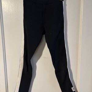 2 pairs of Zara fleece lined leggings one black/white and one gray/white